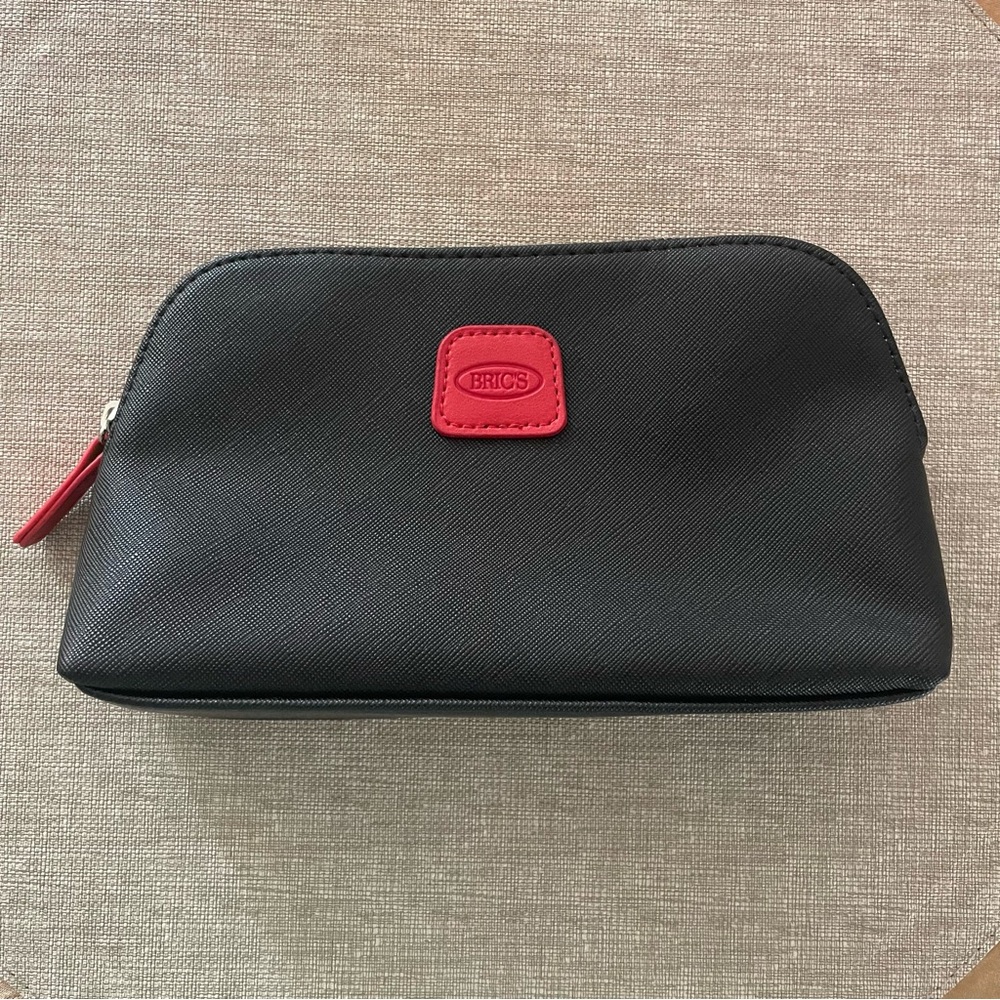 NWOT Bric’s for Qatar Airways Cosmetic Bag